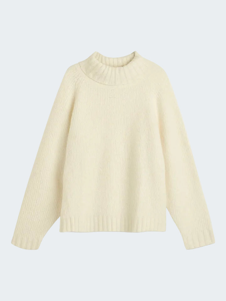 Cream-colored ribbed sweater