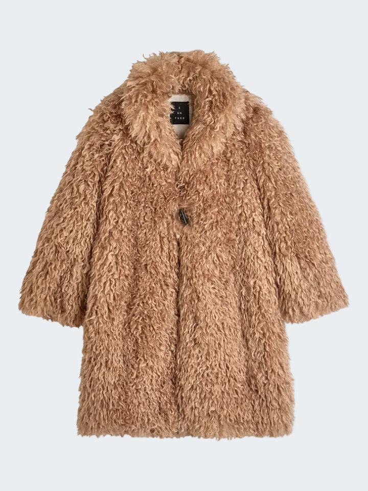 Long coat in fake fur