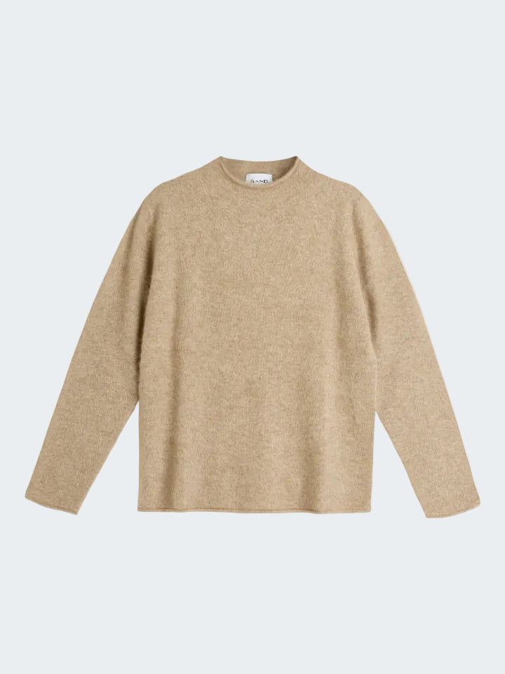 Beige sweater on a white background