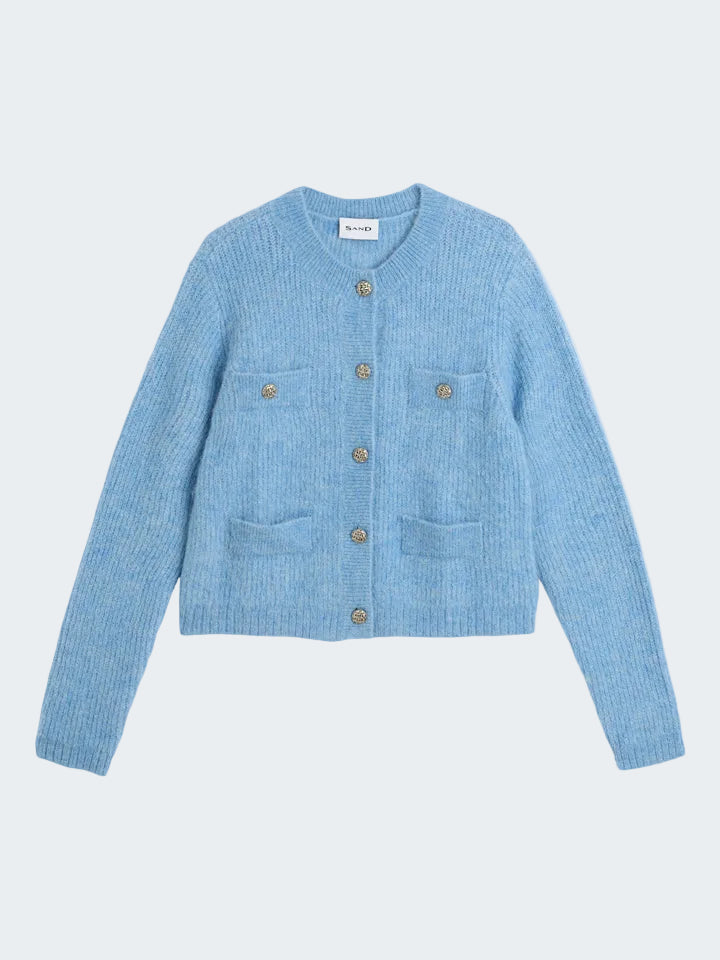 Light blue knitted cardigan with button details on a white background 